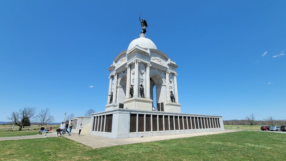 The Pennsylvania Memorial is a must see at Gettysburg. Photo shows Pennsylvania Memorial with people walking around.