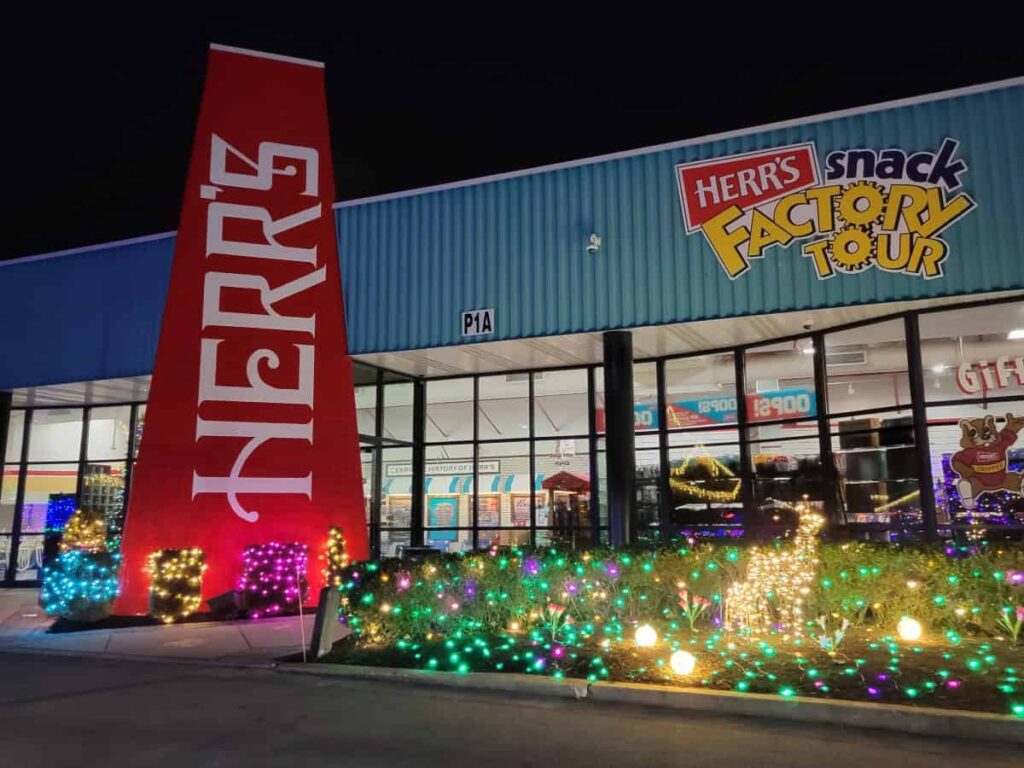 The Herrs headquarters is lit up with holiday lights
