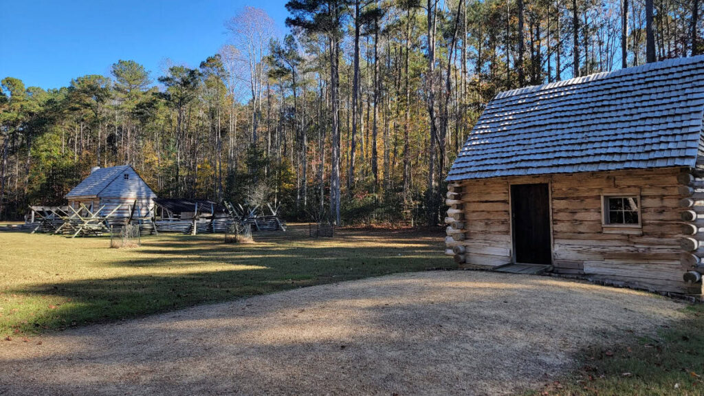 view of replica cabins from the early 19th century depicting the homes of freed blacks