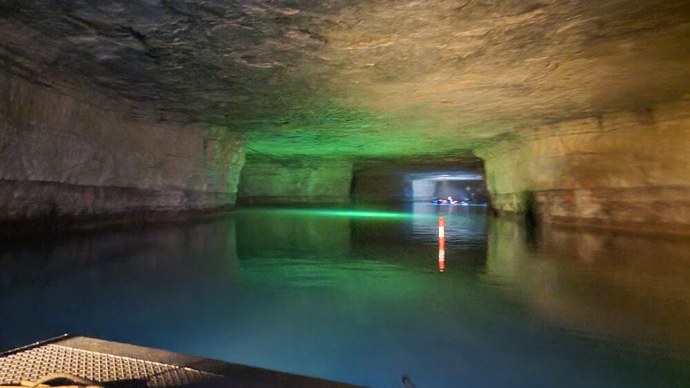 best things to do in red river gorge - view of water in underground mine while seated in boat