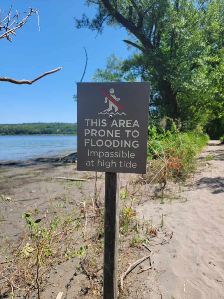 Sign along the Saugerties Lighthouse trail warns visitors that the area is prone to flooding and may be imapssable