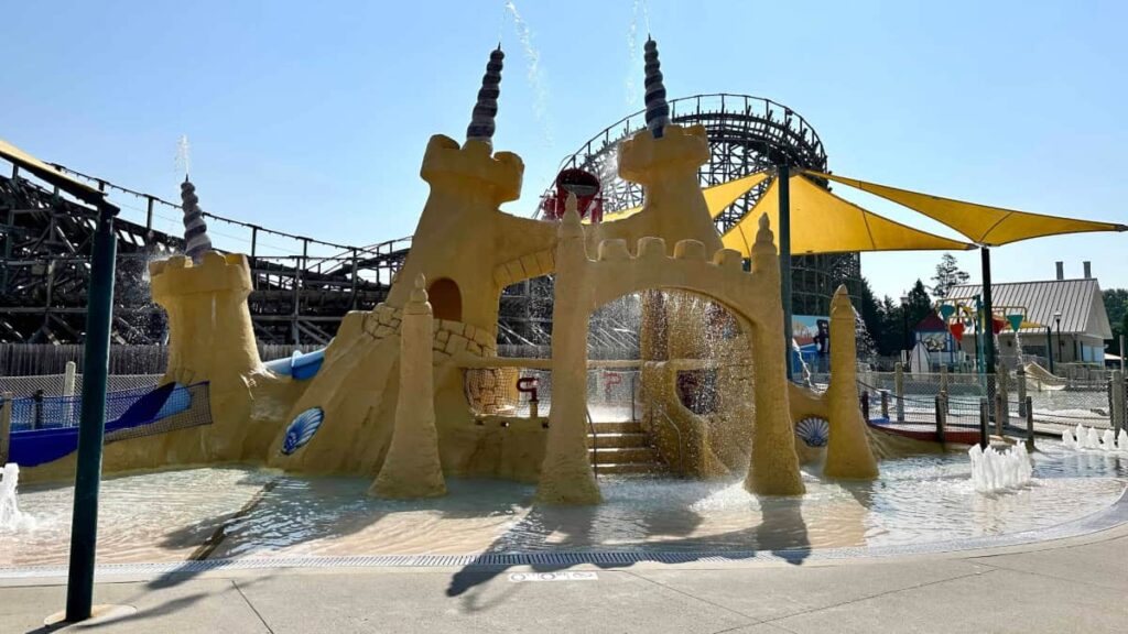 water play structure in the shape of a sand castle