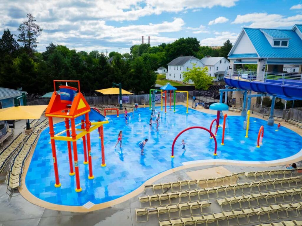 aerial view of a spray playground with seating surrounding