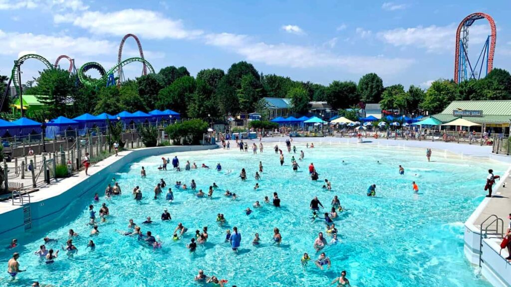 aerial view of the wave pool used by dozens of guests on a sunny day 