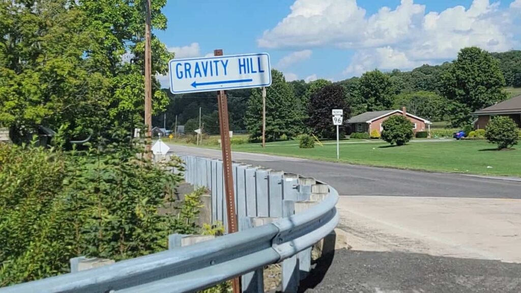 A road sign points to Gravity Hill in Bedford County PA