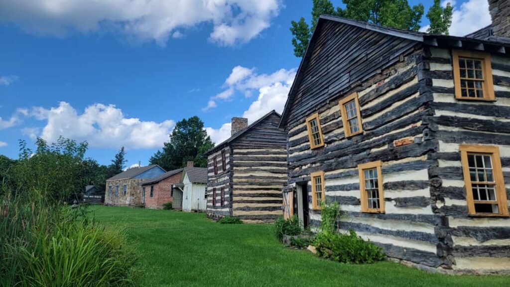 View of several log homes in a row at Bedford Village