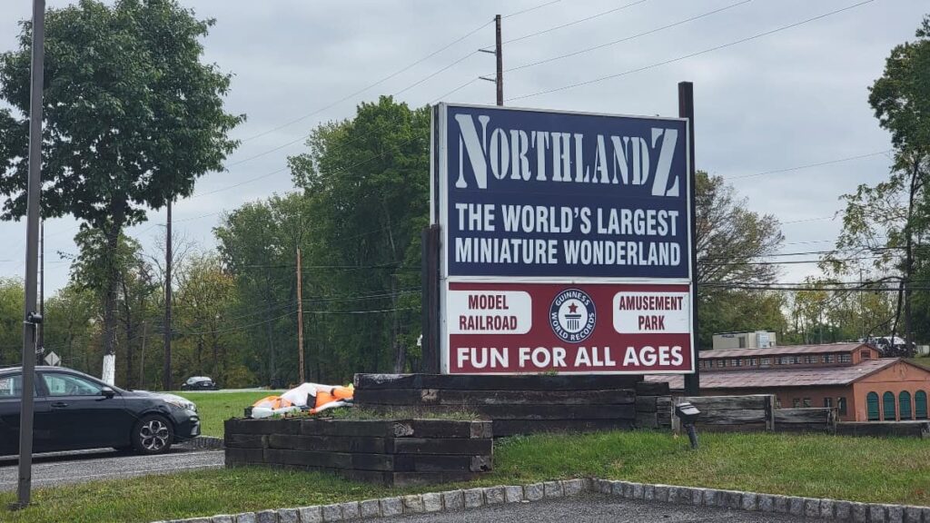 A large outdoor sign reads "Northlandz: World's Largest Miniature Wonderland"