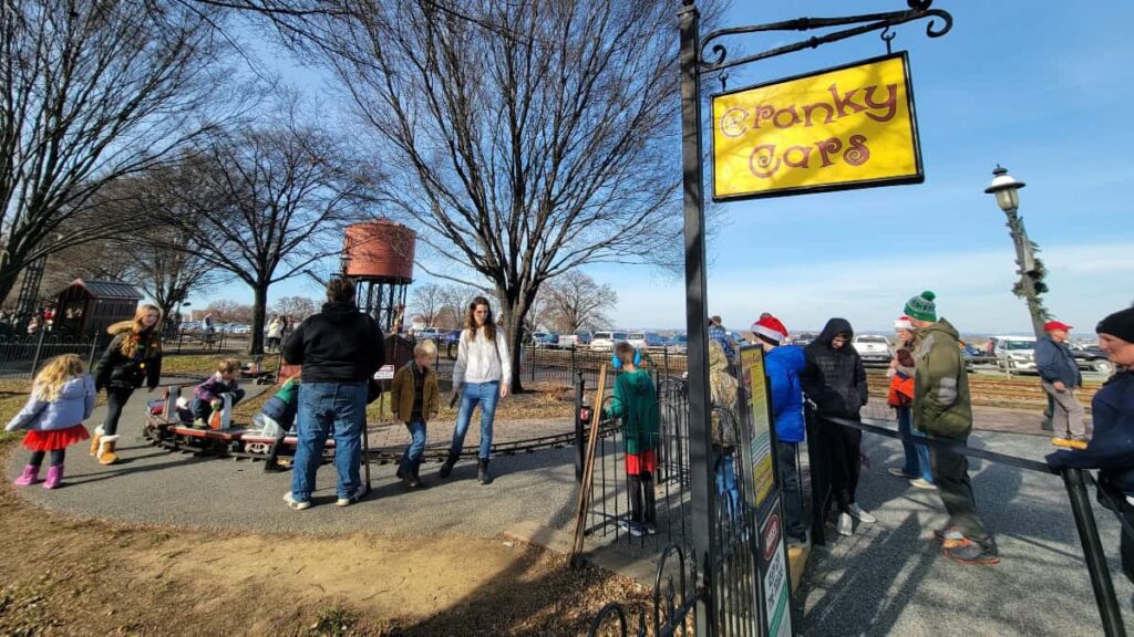 picture of people waiting for their children to get off the Cranky Cars at Strasburg Railroad