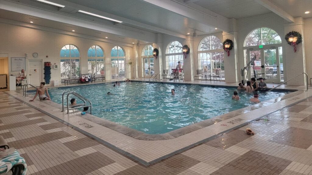 people enjoy the indoor pool at the Hotel Hershey