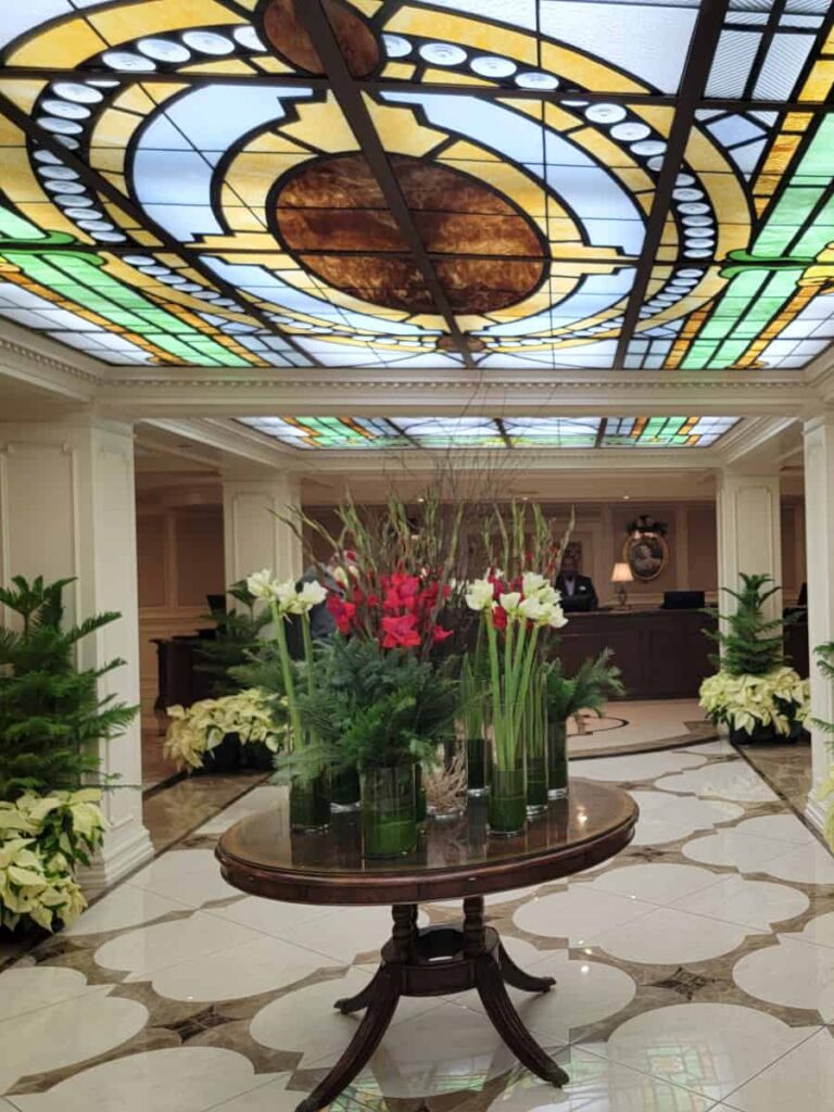 a stained glass ceiling adorns the lobby of the Hotel Hershey