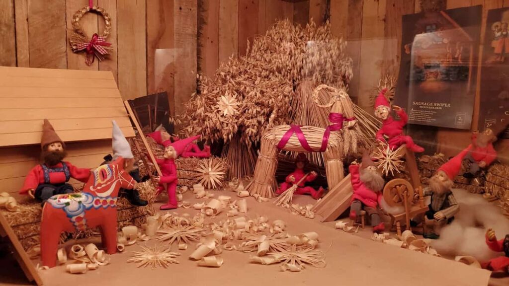 Scandinavian style figures demonstrate Christmas traditions