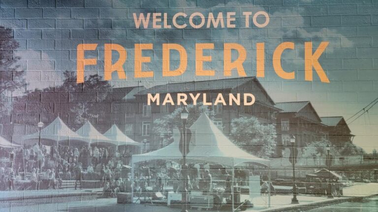 Mural painted on wall that reads "welcome to Frederick Maryland"